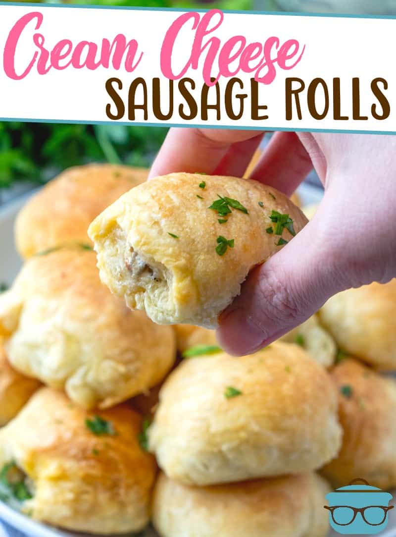 3-Ingredient Puff Pastry Cream Cheese Sausage Rolls recipe from The Country Cook. Hand holding up one of the sausage rolls.