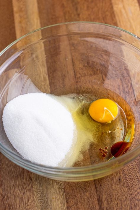 egg, oil and sugar in a bowl.