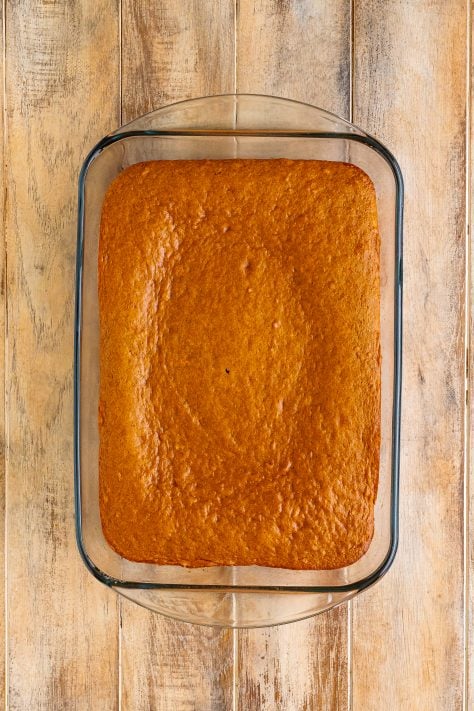 A baked Carrot Cake in a glass baking dish.