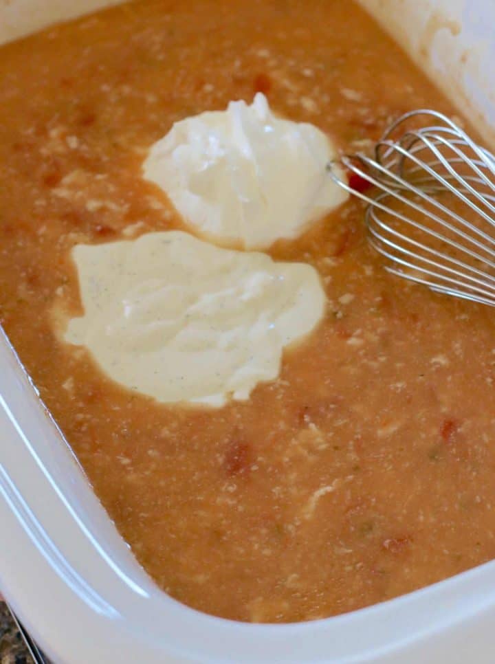 sour cream and ranch dressing whisked into salsa mixture in the bottom of a casserole slow cooker.