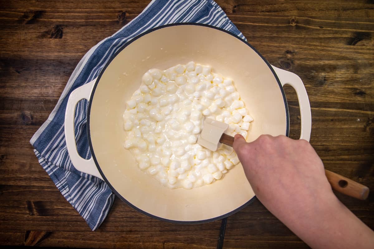 mini marshmallows added to melted butter in large pot