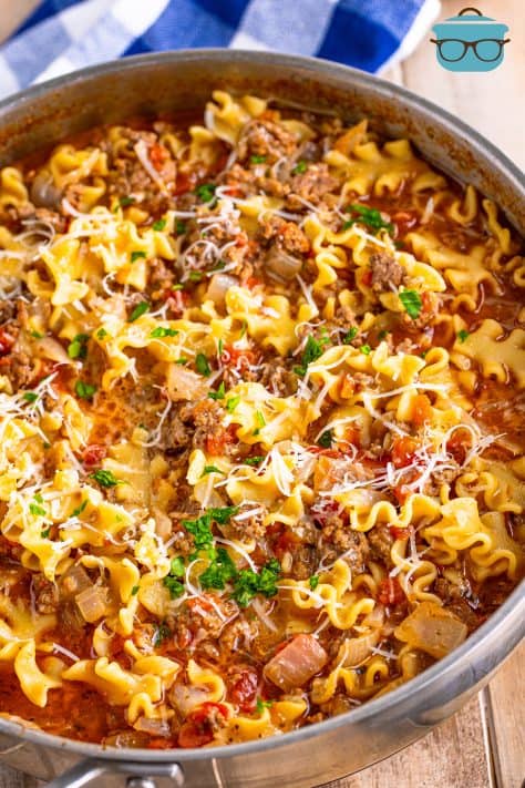 an overhead photo of skillet lasagna being showed in a large silver pan.