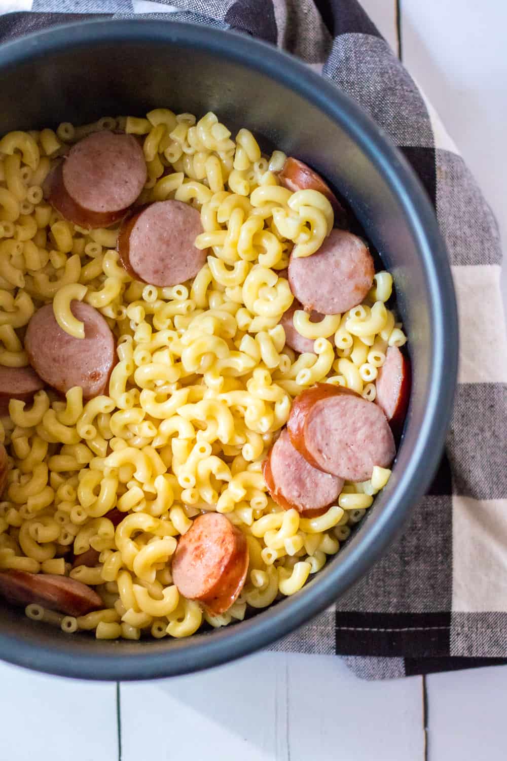 sausage and cooked elbow macaroni after cooking. 