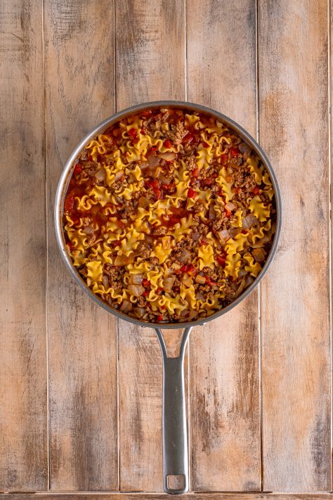 cooked pasta shown in skillet.