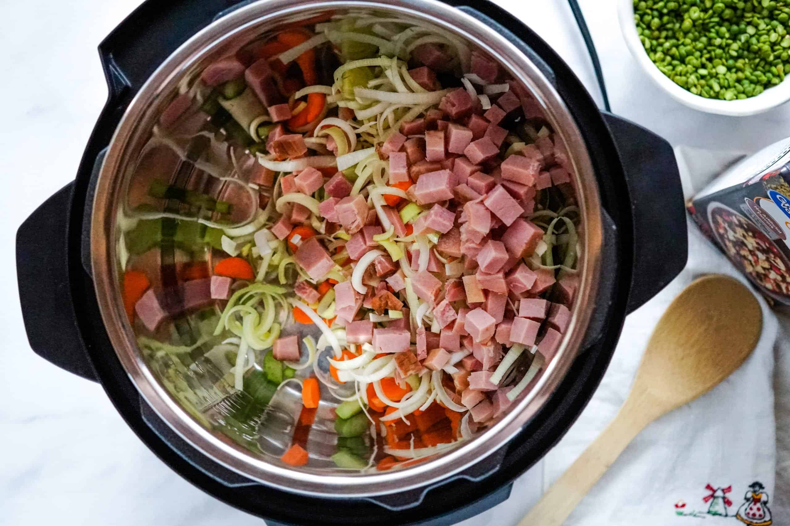 ham, leeks, carrots and celery added to the bottom of the instant pot.