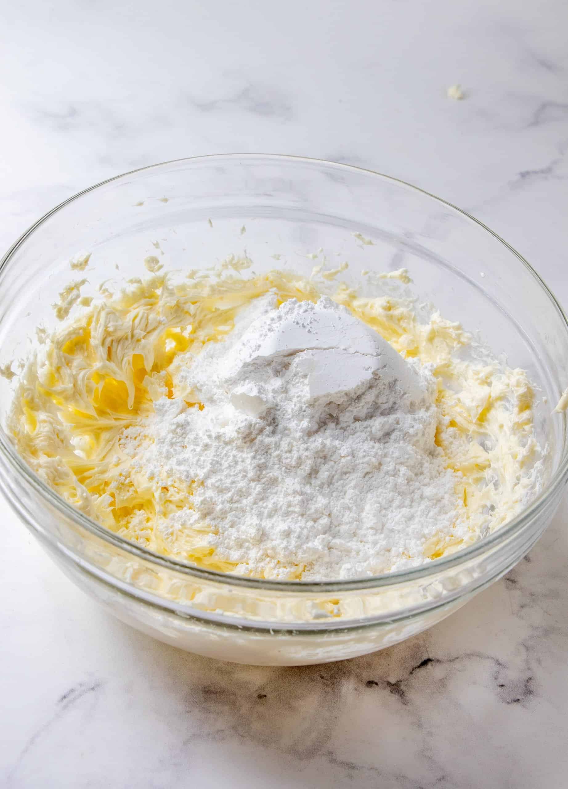 powdered sugar added to butter cream cheese mixture.