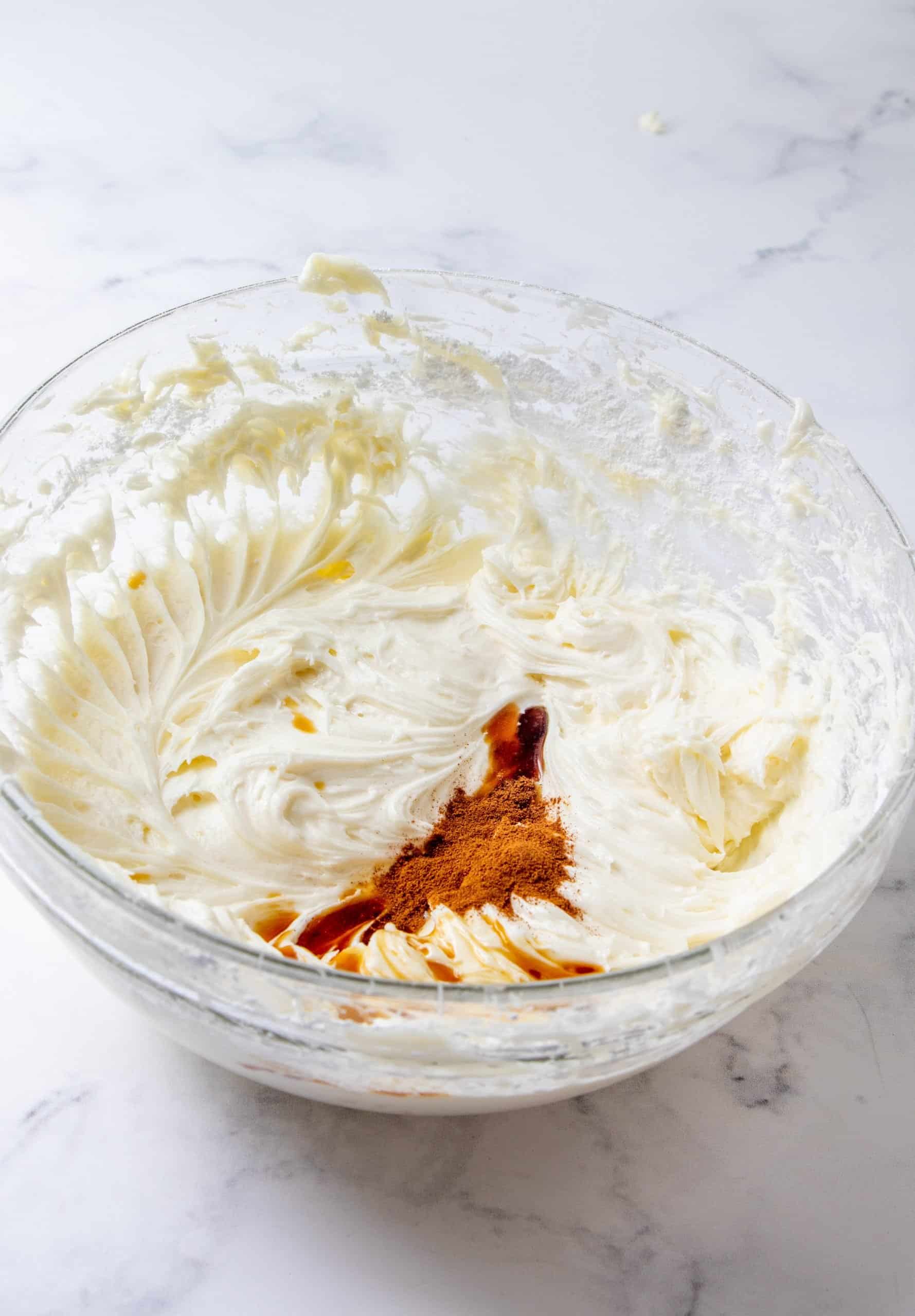 vanilla extract and pumpkin spice added to cream cheese mixture.