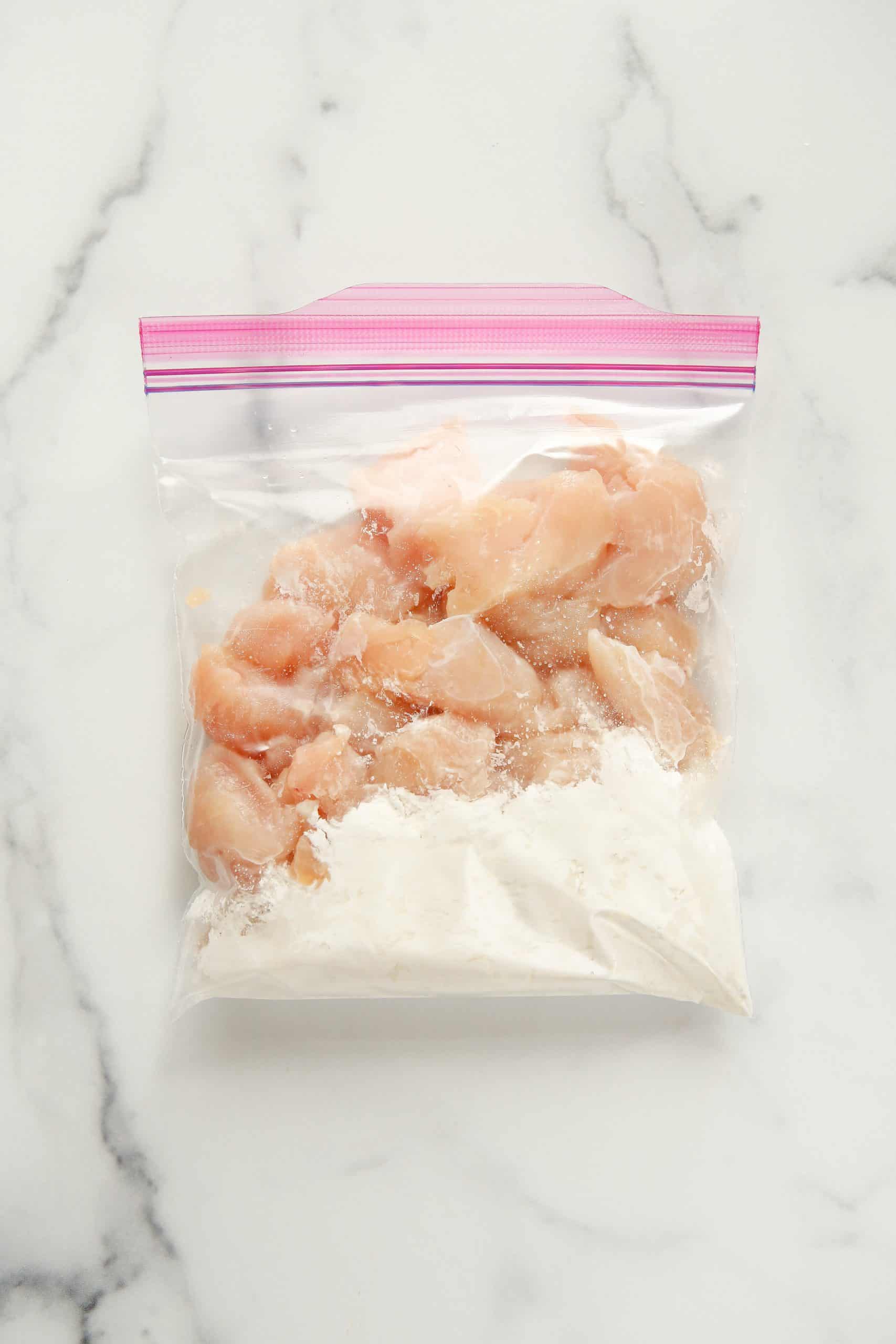 diced chicken breast in a ziploc bag filled with cornstarch.