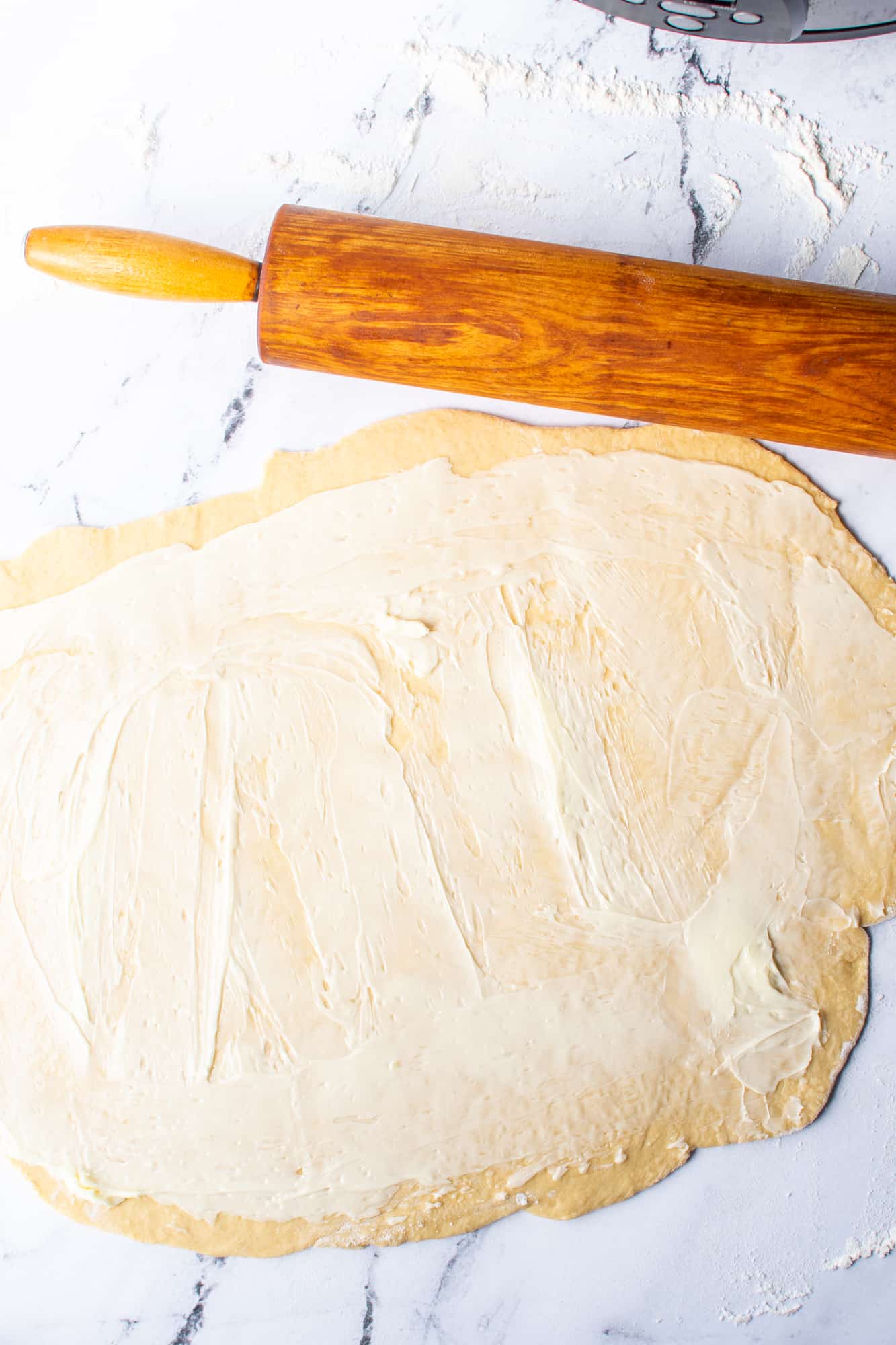 softened butter spread onto dough batter