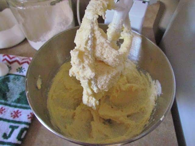 shortening, sugar, vanilla and eggs mixed together in a steel stand mixer bowl