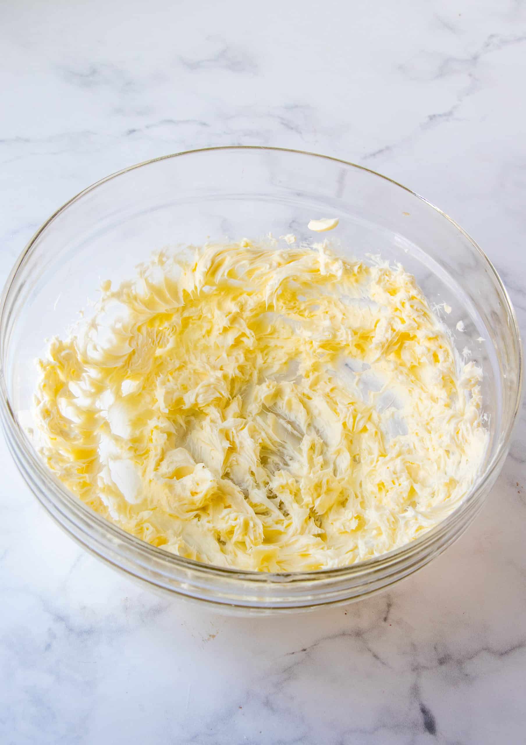 softened butter whipped until smooth in a clear bowl.