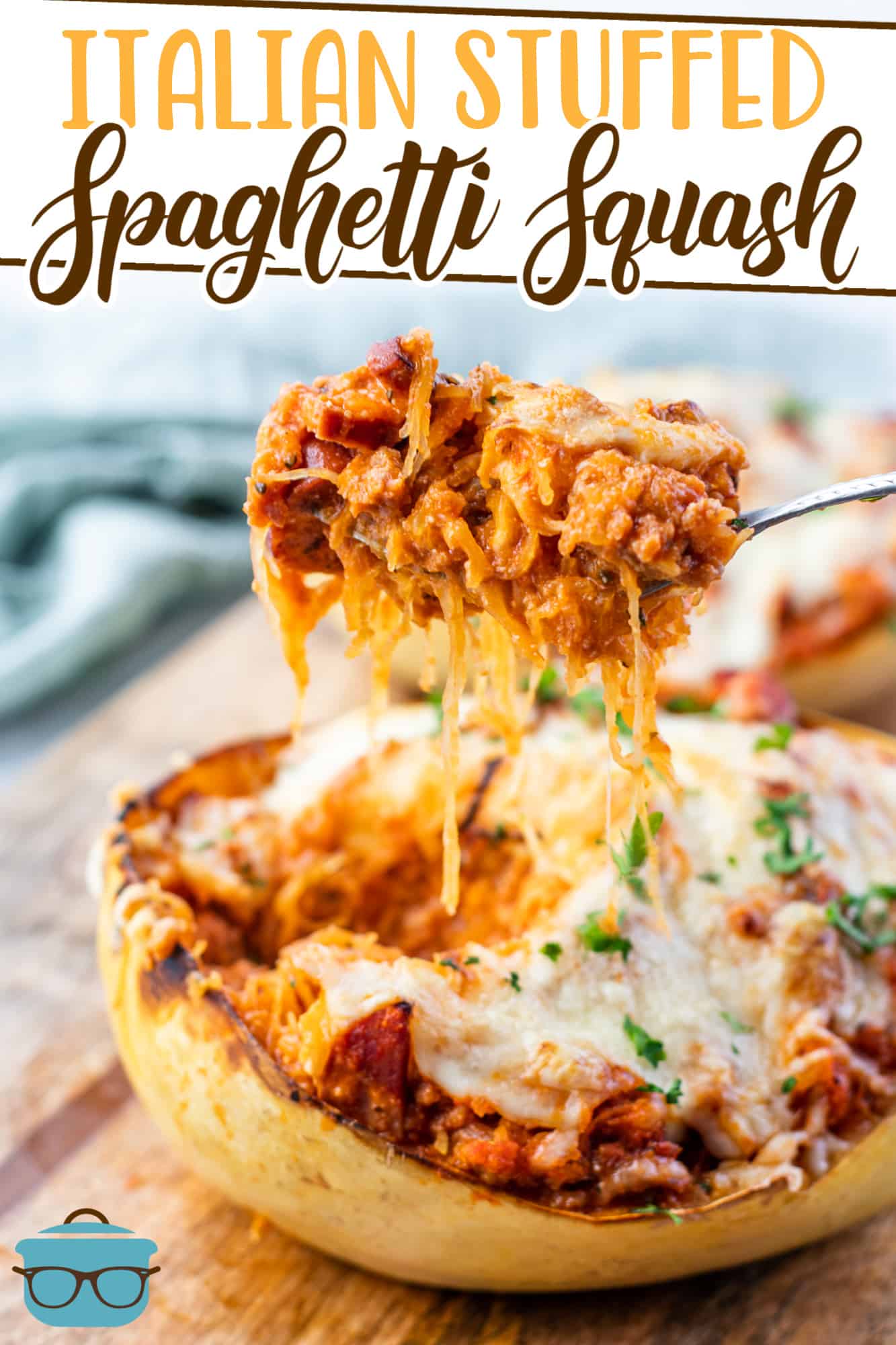 Italian Stuffed Spaghetti Squash recipe from The Country Cook, shown with a spoon scooping out some of the squash filling
