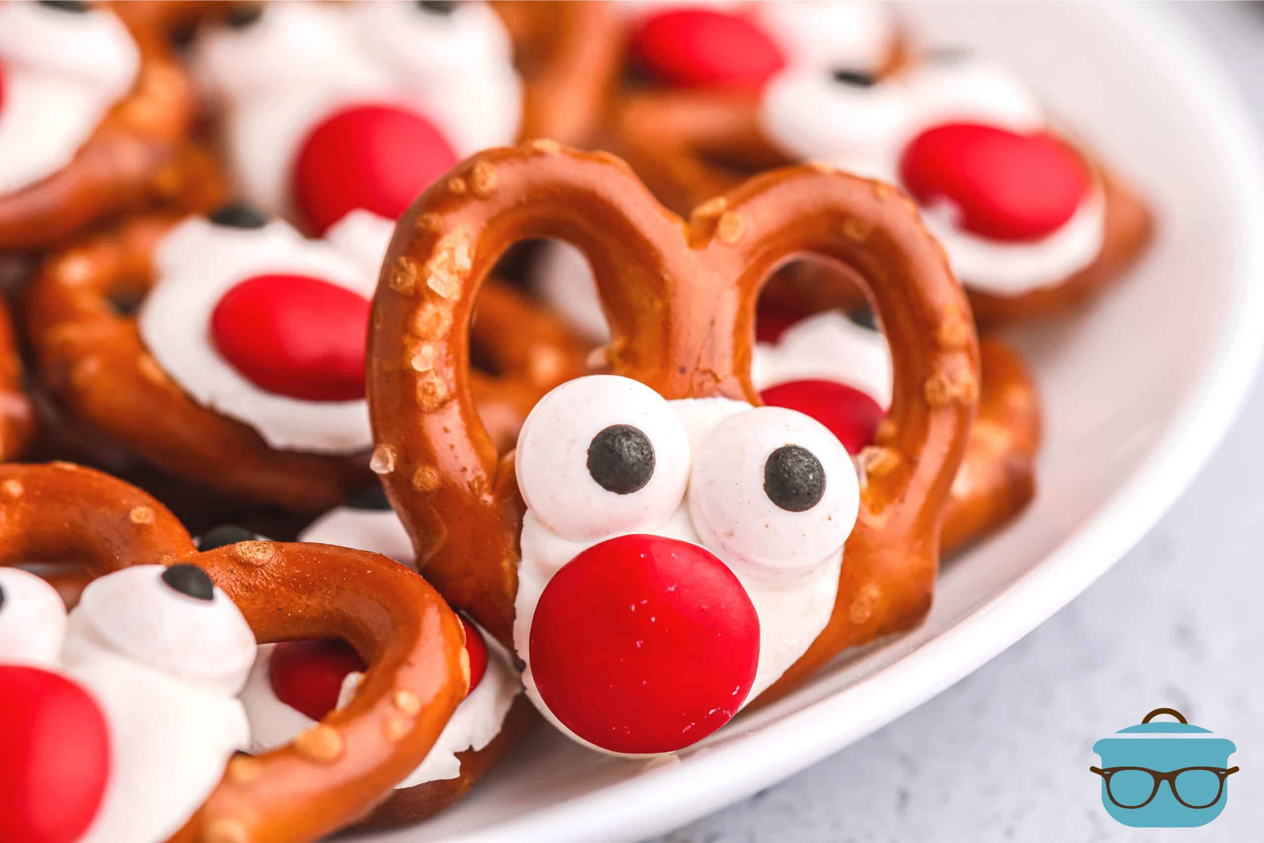 closeup photo of reindeer pretzel on a white plate.