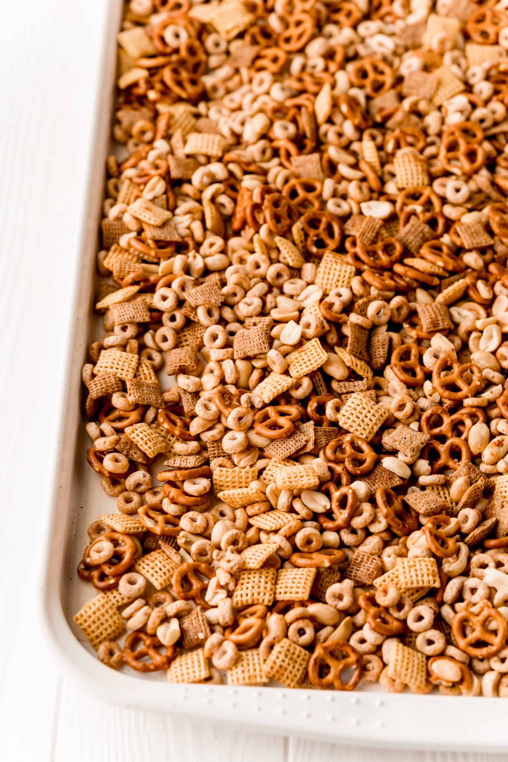 The Best Party Chex Mix spread out onto baking pan