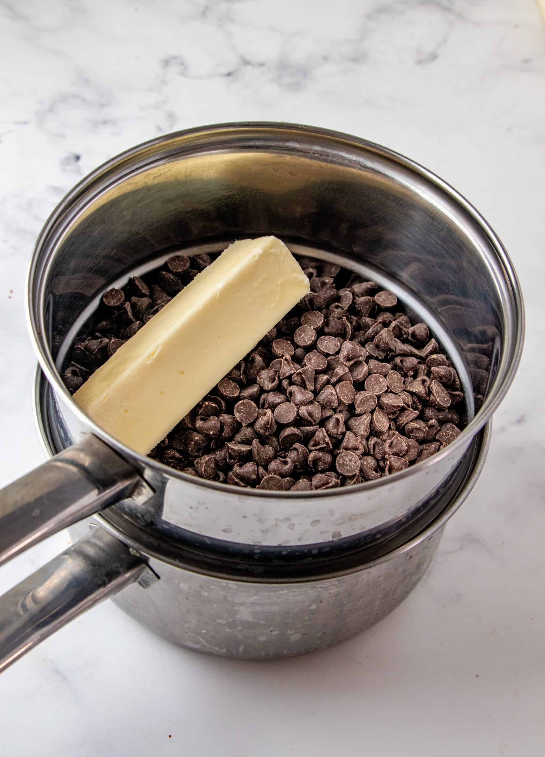 Chocolate chips and butter in double boiler for sauce.