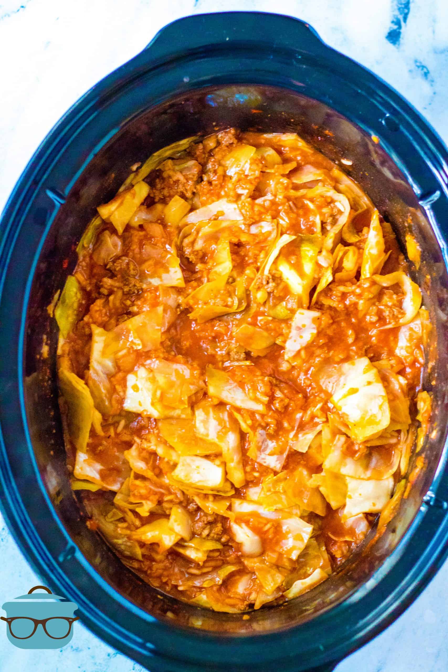 Finished Crock Pot Unstuffed Cabbage Rolls shown in the oval slow cooker.