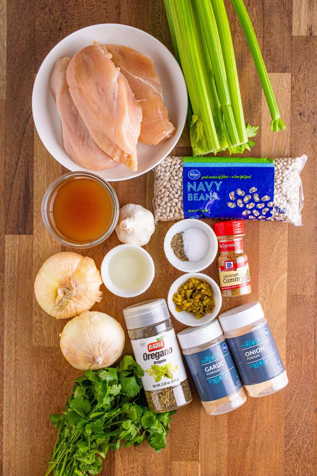 navy beans, chicken brests, onions, celery, garlic, garlic powder, onion powder, cumin, oregano, jalapeños and low sodium chicken stock.