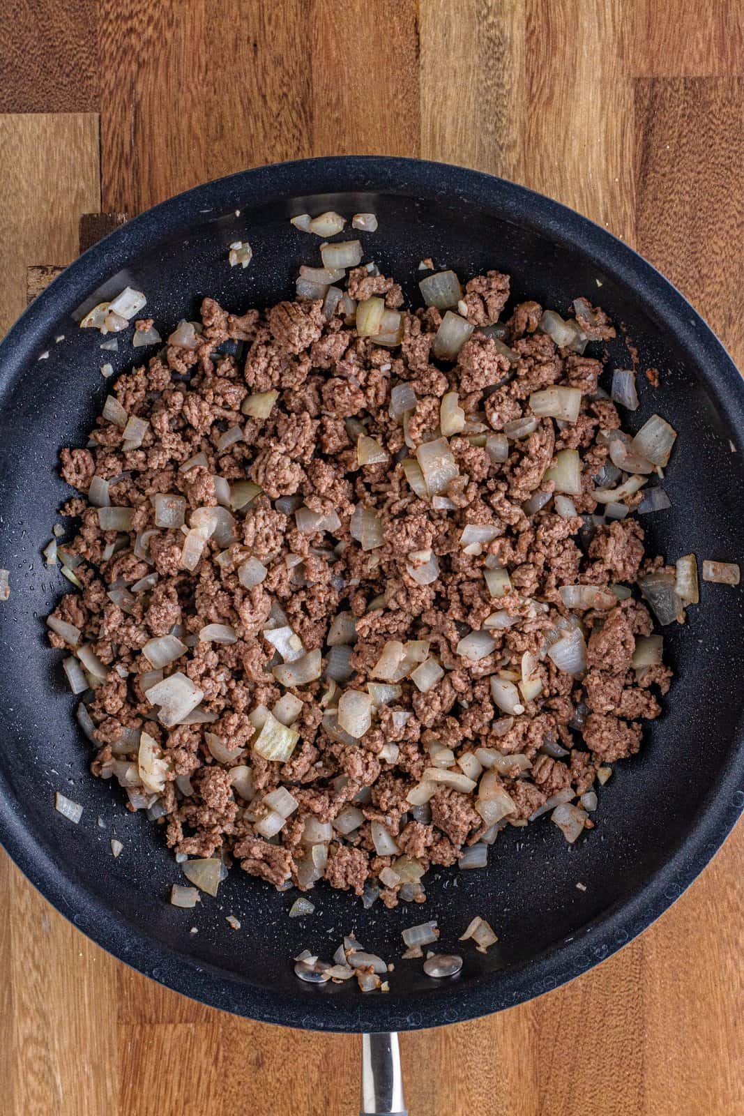 browned and crumbled ground beef with onion and garlic. 
