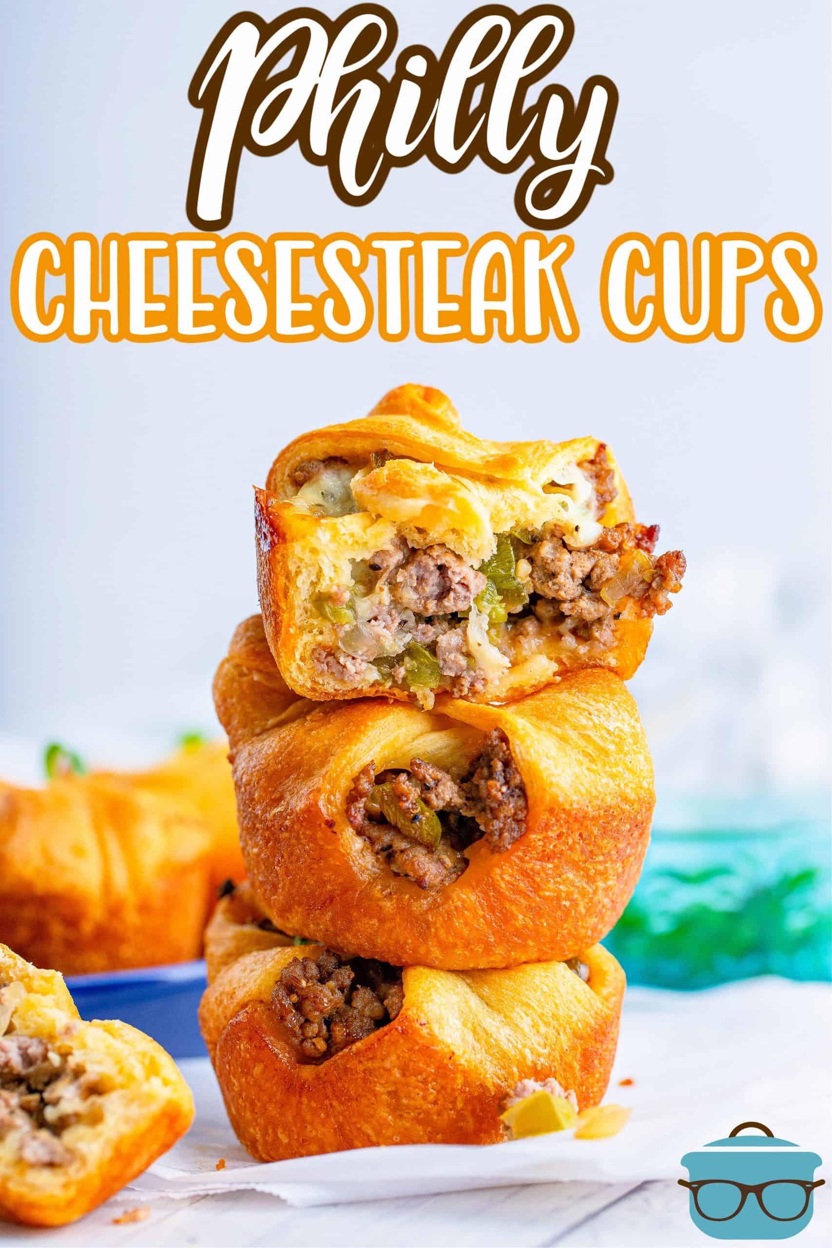 Three stacked Philly Cheesesteak Cups on a napkin.