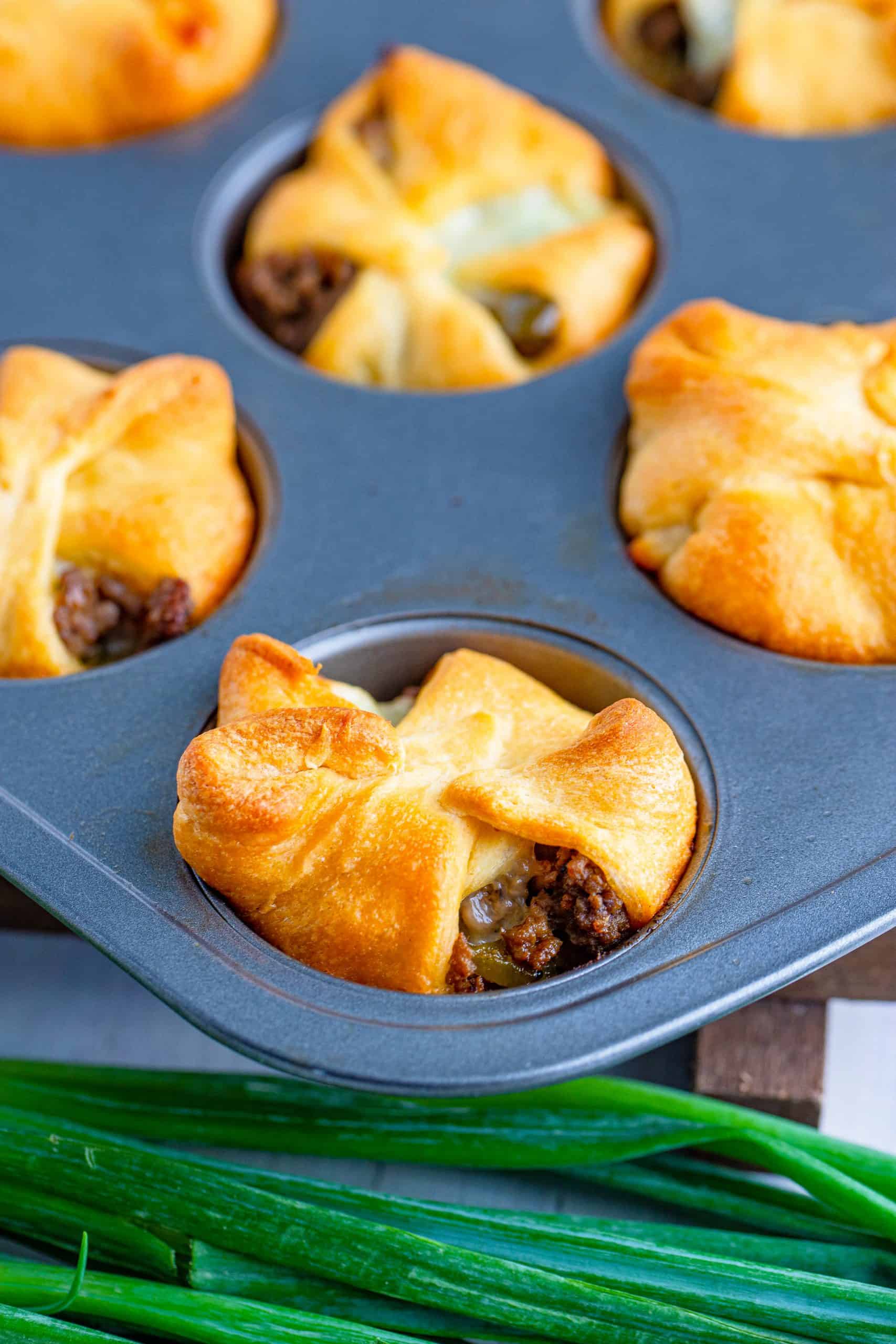 Baked Philly Cheesesteak Cups in muffin tin.