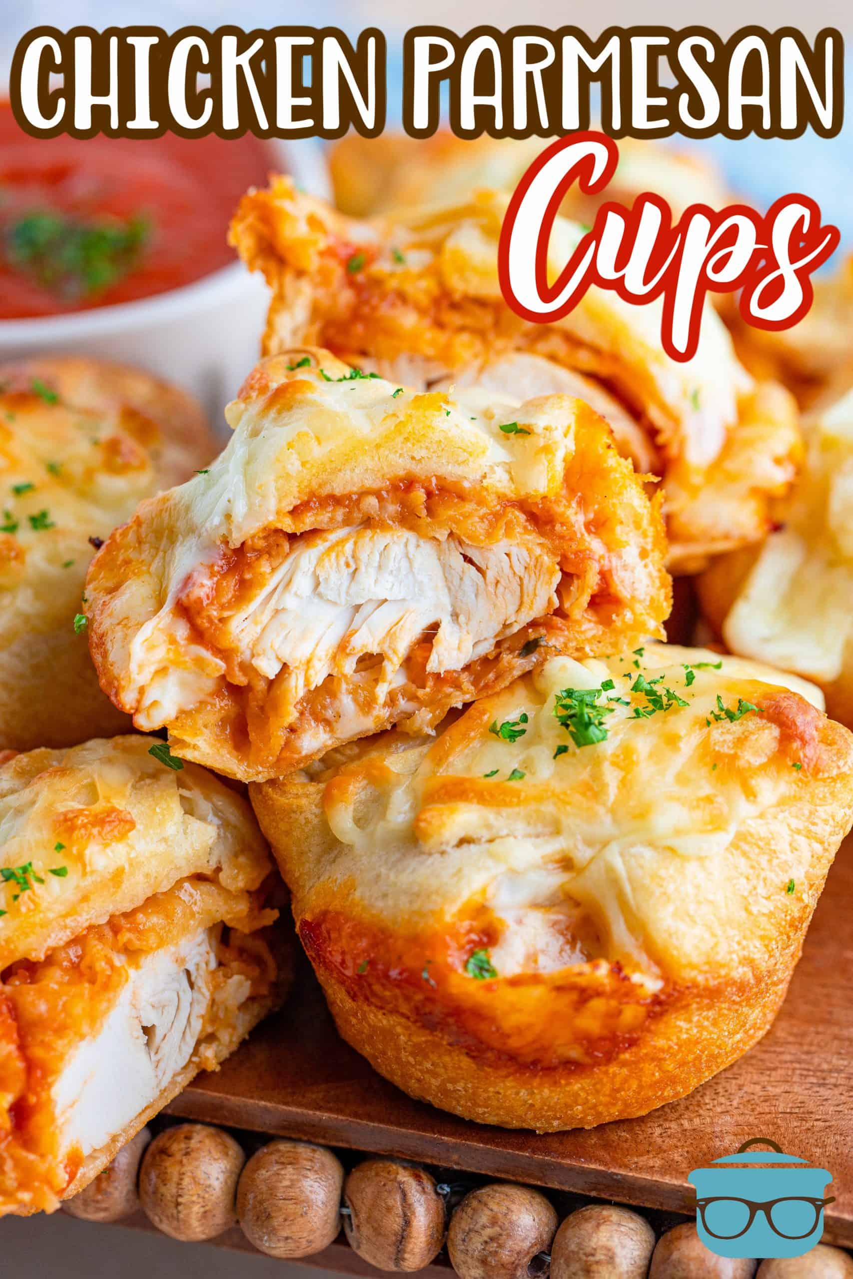 Stacked Chicken Parmesan Cups with one with bite taken out