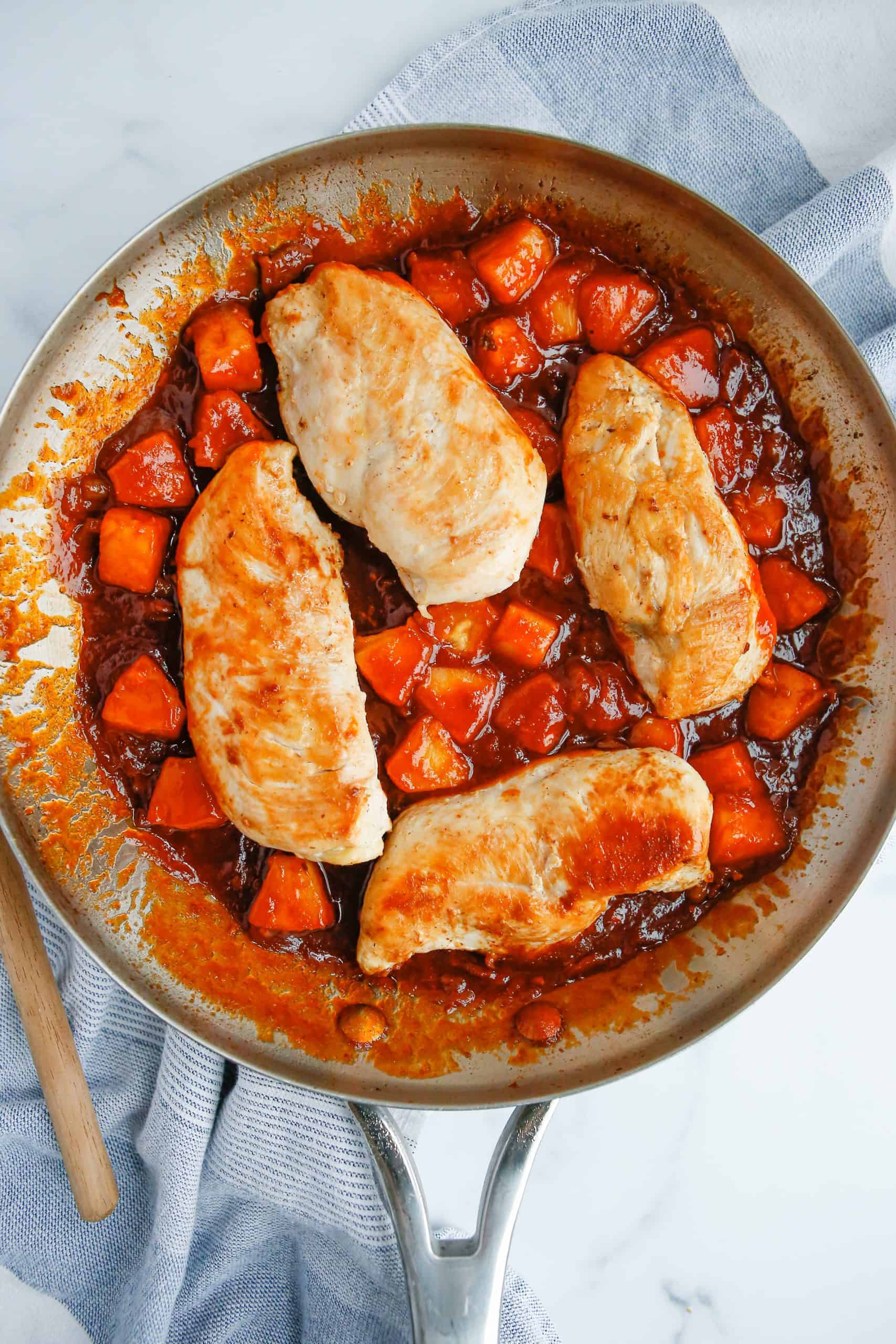 Chicken added back to pan with other ingredients.