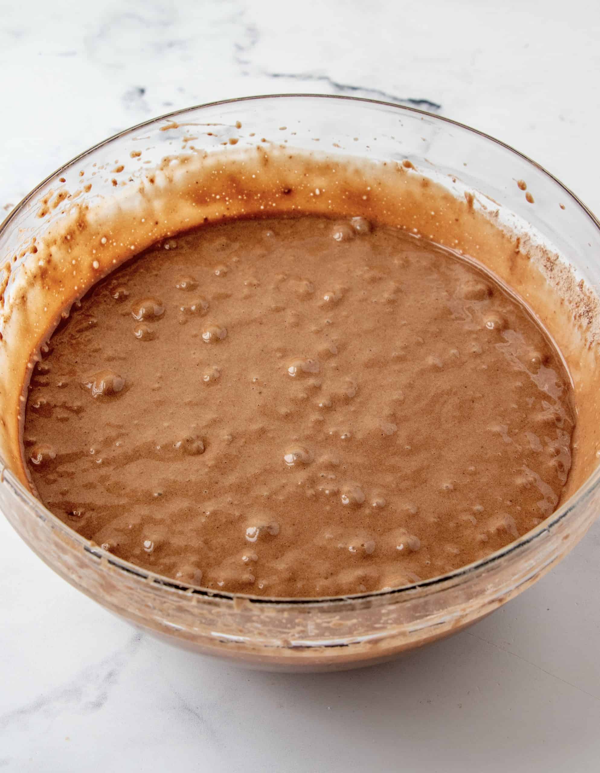 Chocolate cake mix batter mixed up in bowl.