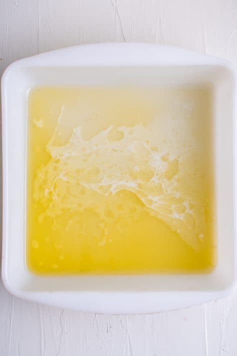 Melted butter in baking pan 