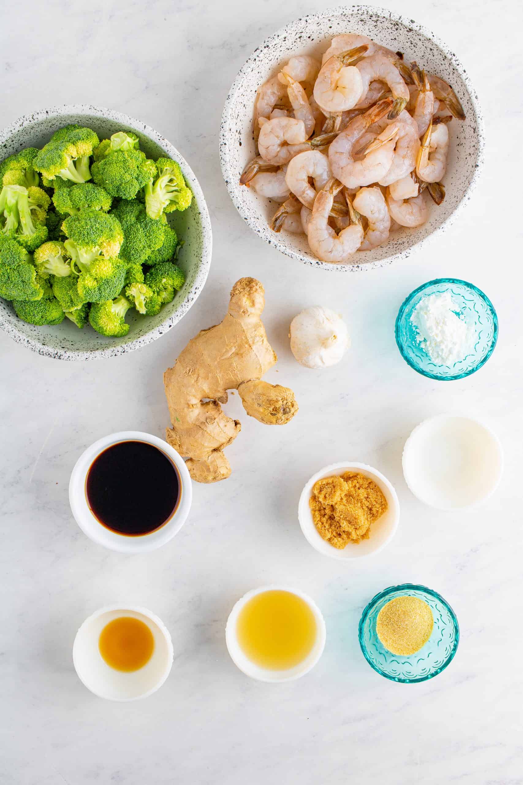 Ingredients needed to make One Pan Shrimp and Broccoli: shrimp, cornstarch, garlic powder, soy sauce, chicken stock, garlic, brown sugar, cornstarch, white vinegar, ginger, sesame oil, vegetable oil, broccoli florets, water