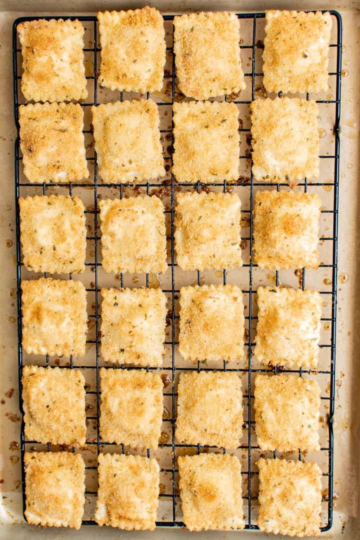 Finished Easy Toasted Ravioli on wire rack.