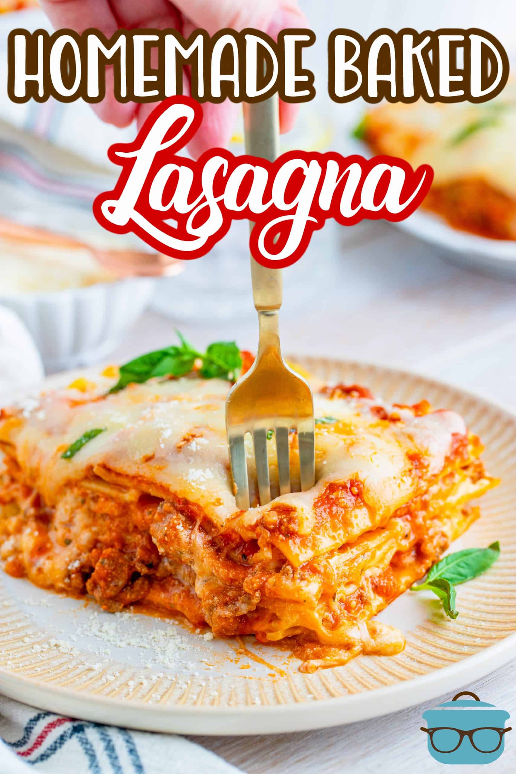 Fork going into slice of Homemade Baked Lasagna Recipe, image with text that says Homemade Baked Pasta.