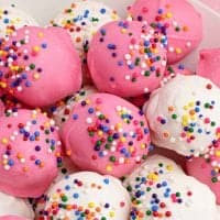 Close up of white and pink Circus Animal Cookie Balls thumbnail image