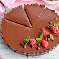 Raspberry Chocolate Tart thumbnail image with two slices cut