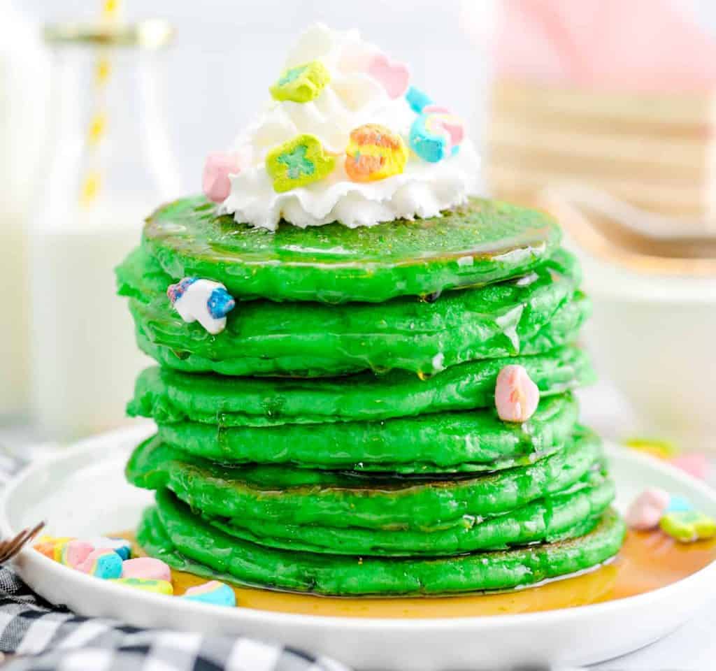 Stacked Green Pancakes with toppings square image