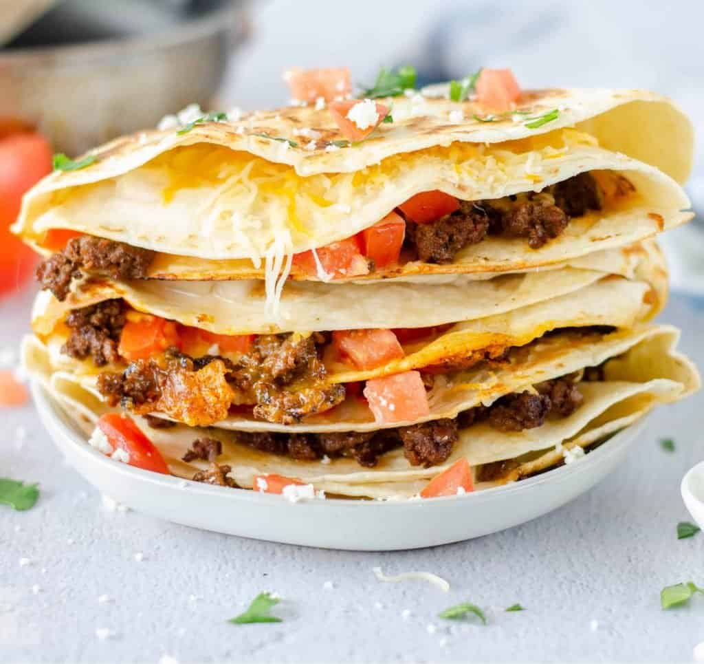 Plate of Taco Quesadillas on white plate uncut