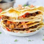 Plate of Taco Quesadillas on white plate uncut