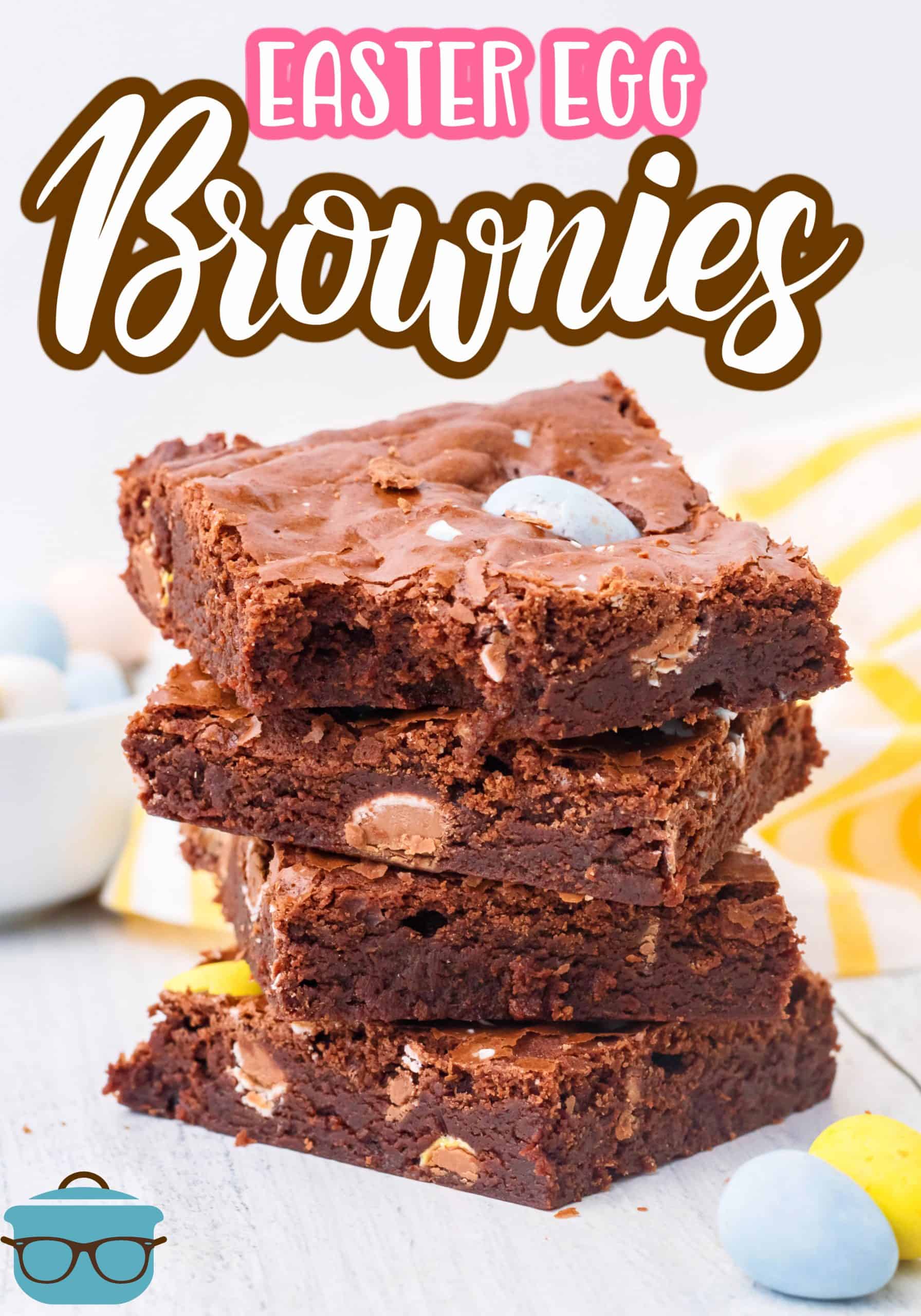 Stacked Easter Egg Brownies with bite taken out of the top one.