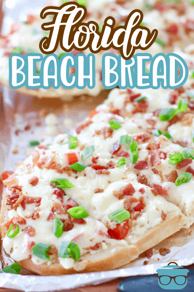 Florida Beach Bread recipe from The Country Cook, sliced cheese bread shown on aluminum foil on a baking sheet