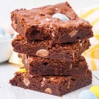 Close up of Stacked Easter Egg Brownies with bite take out of one square image