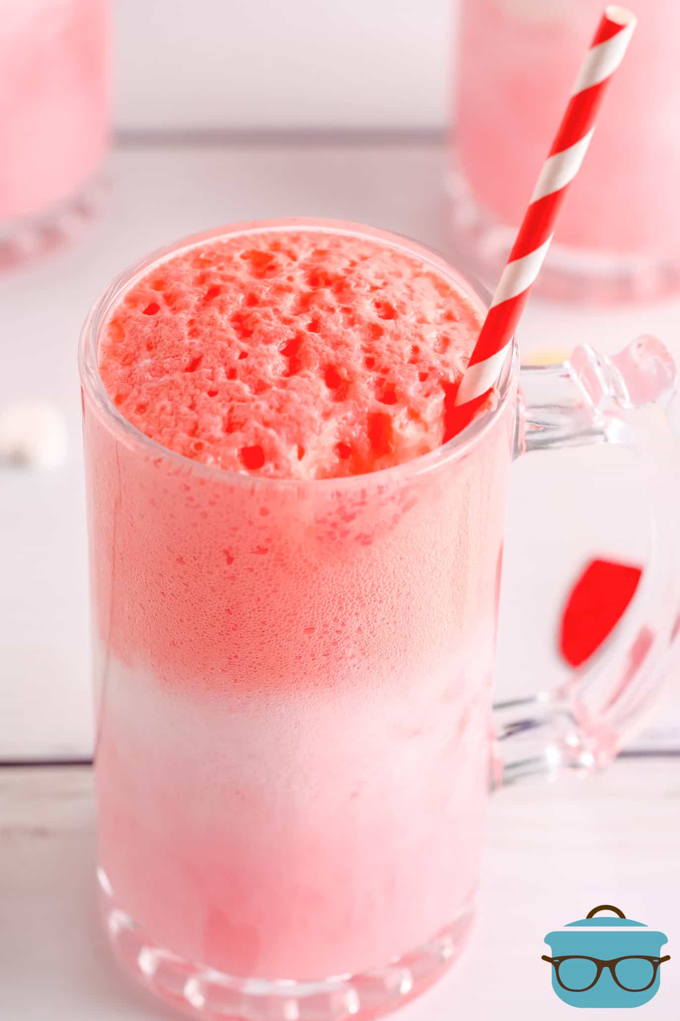 One Strawberry Cream Float Recipe before topping in glass foaming up.