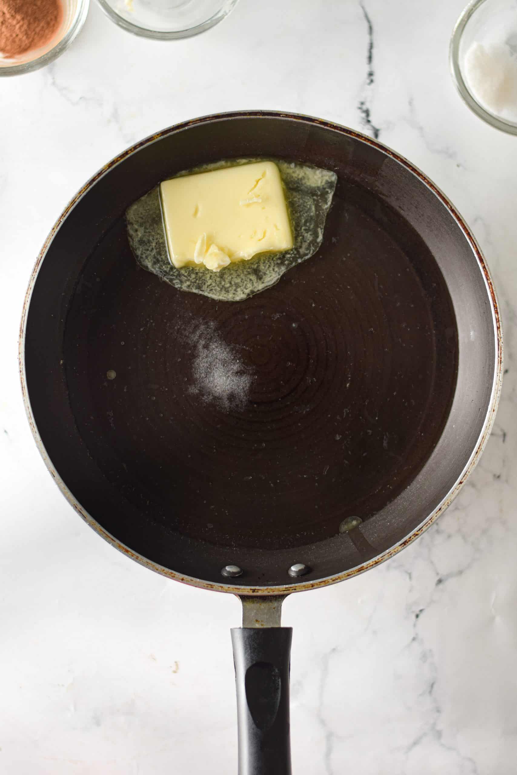 butter in a black cast iron skillet.