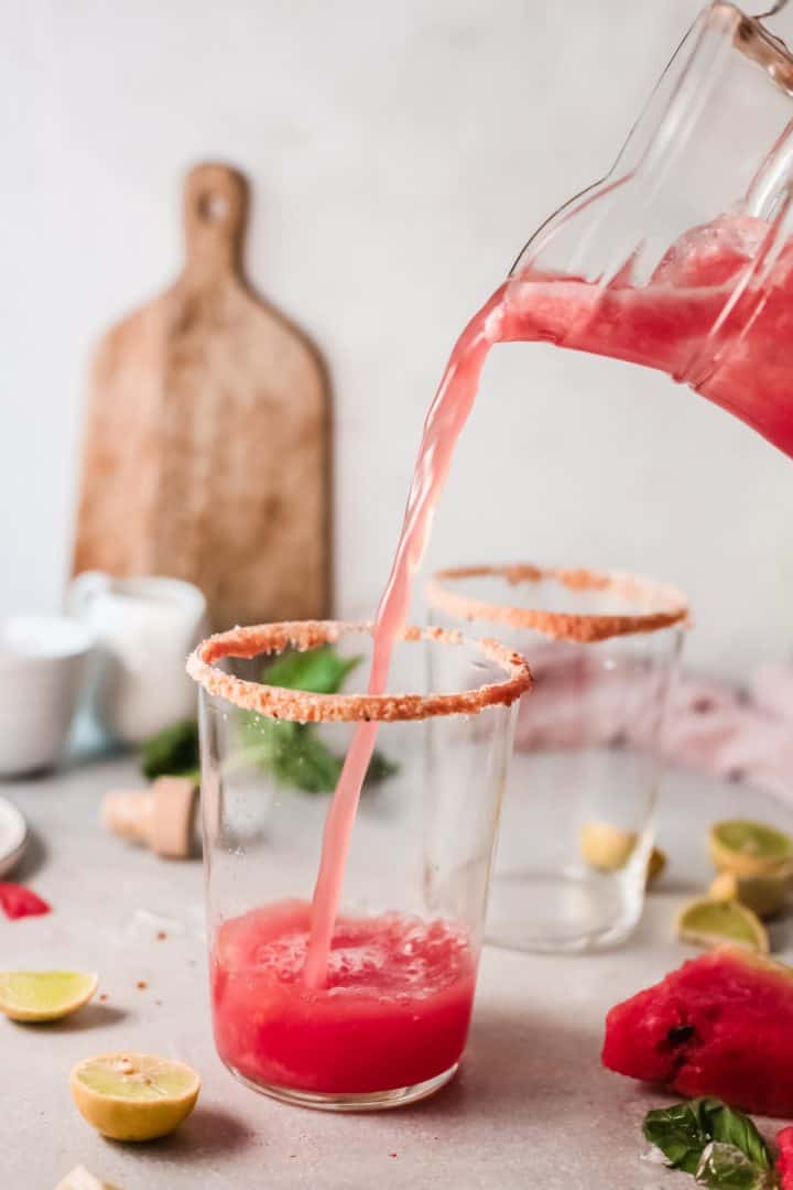 Margarita mixture being poured into glass