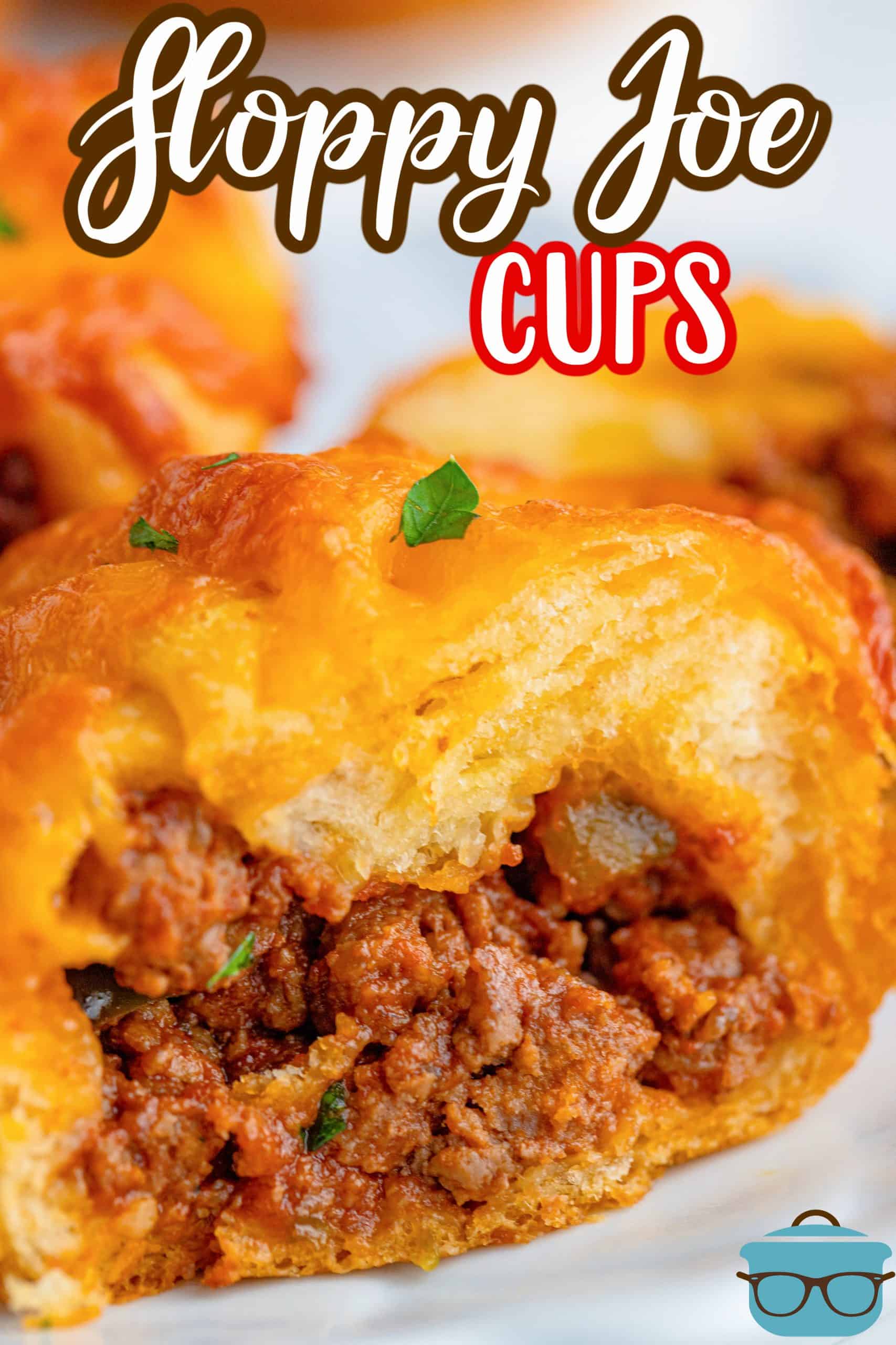 Sloppy Joe Cups on plate with one cut open showing filling.