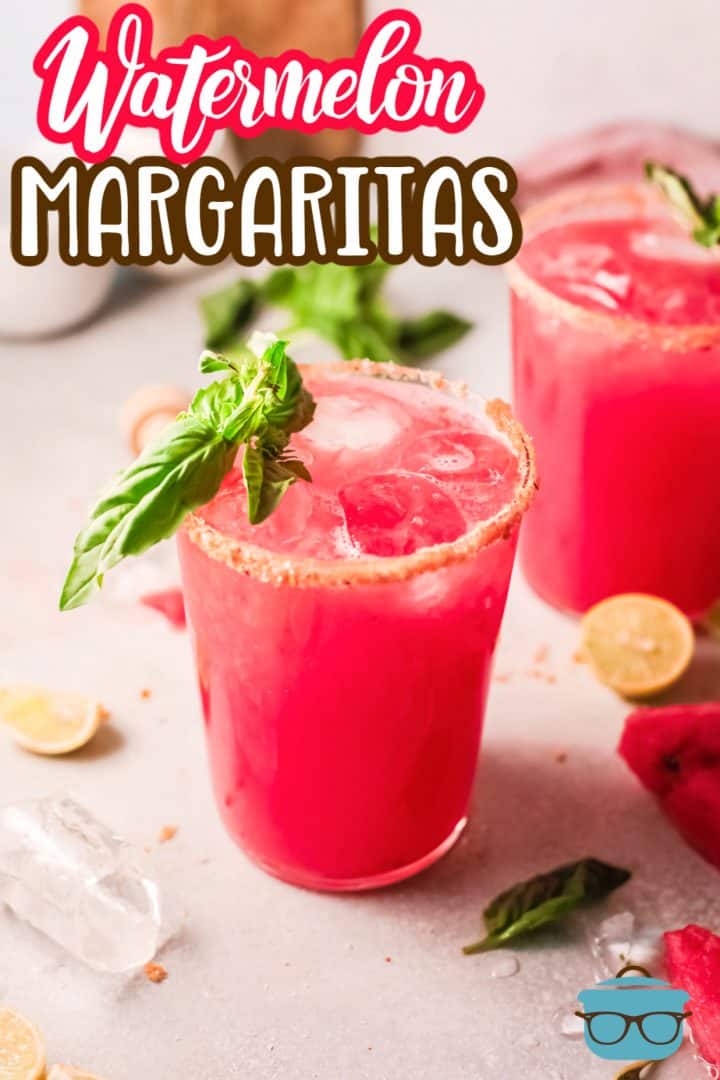 Ice filled glass of Watermelon Margaritas with basil Pinterest image