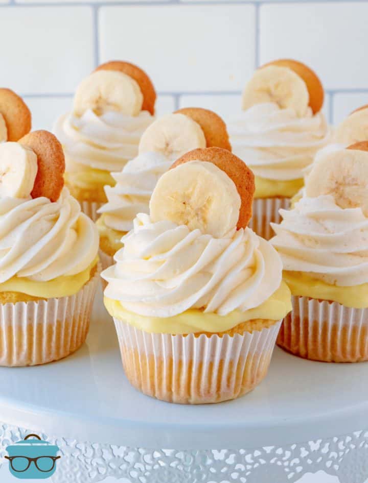 Banana Pudding Cupcakes on cake stand frosted and garnished.