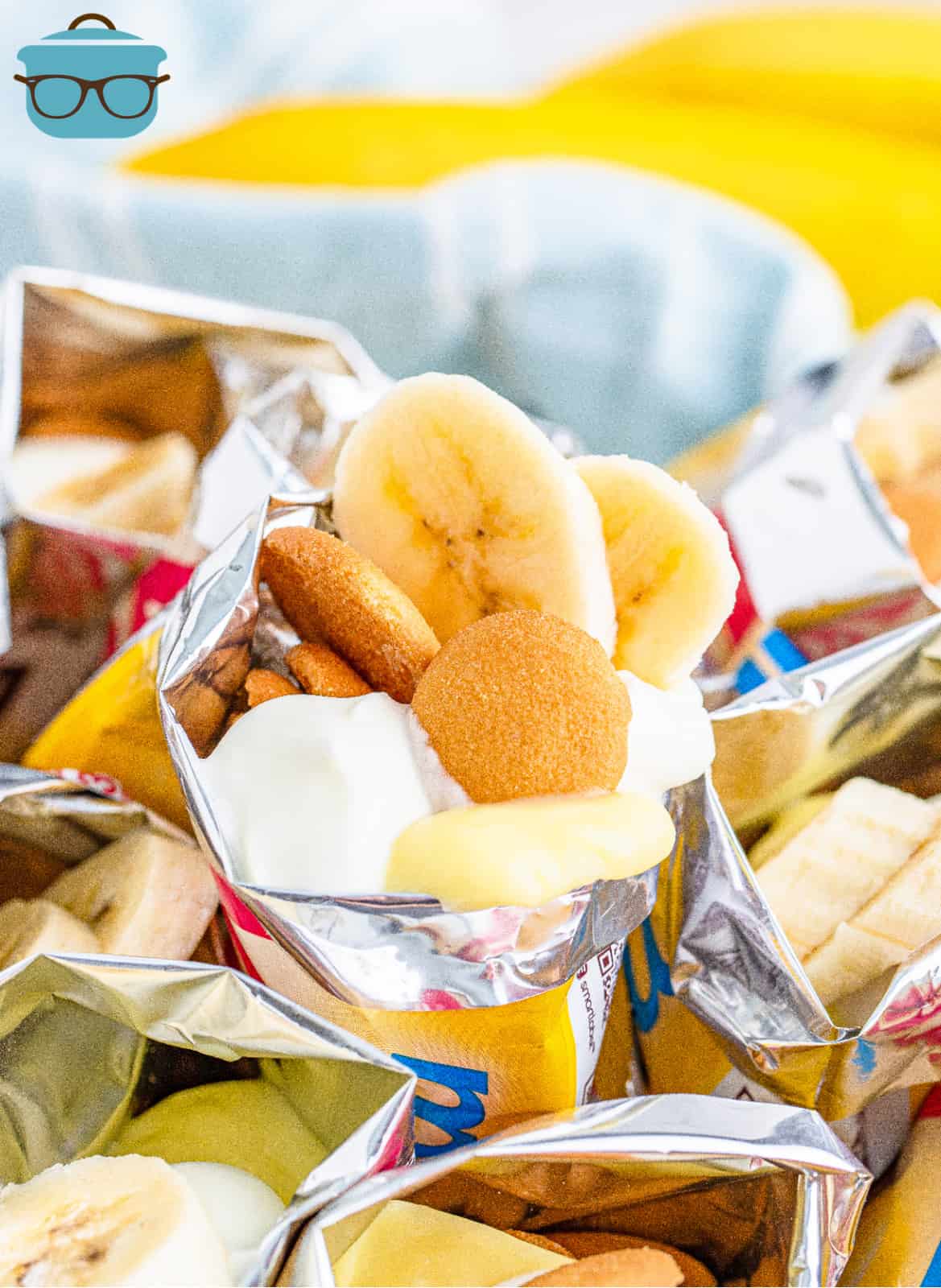 Close up of Walking Banana Pudding in bag with bananas and vanilla wafers sticking out.