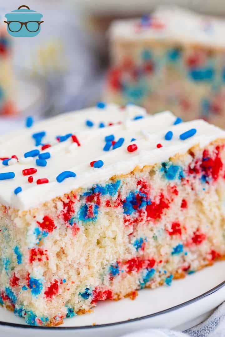 Close up side view of Funfetti Cake showing colors inside cake