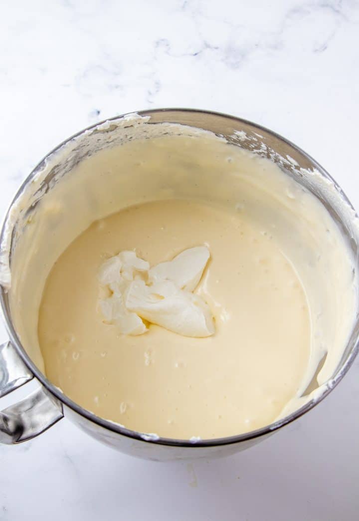 Sour cream added to cream cheese mixture.