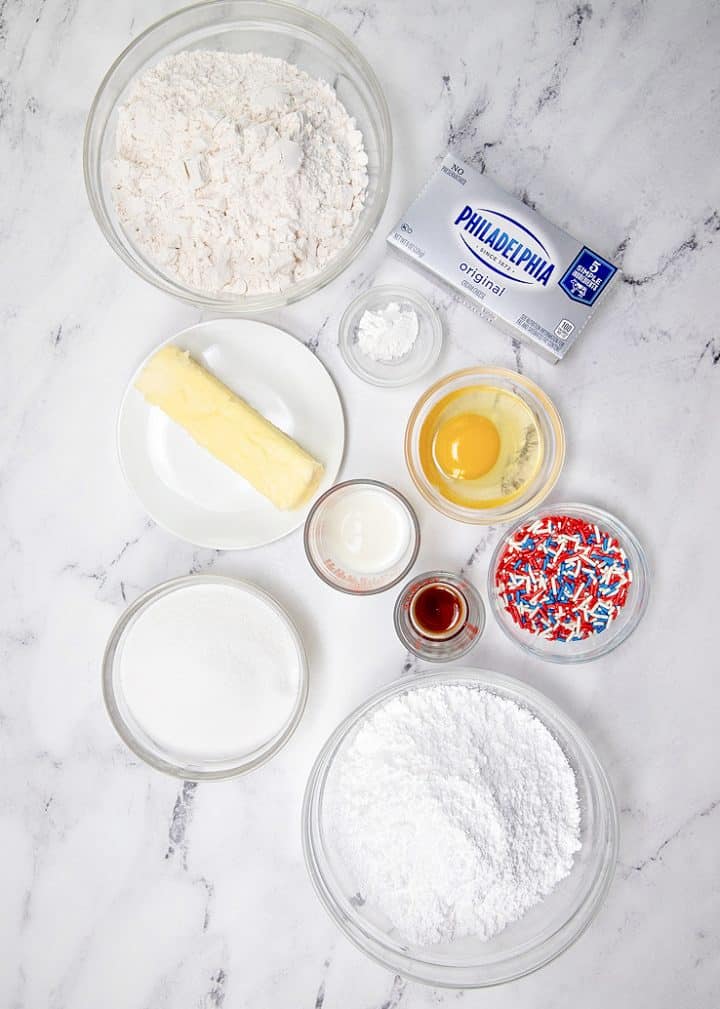 Ingredients needed: salted butter, granulated sugar, egg, vanilla extract, all-purpose flour, baking powder, patriotic sprinkles, powdered sugar, cream cheese and milk