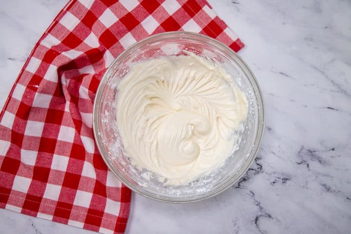 Frosting mixed up in clear bowl
